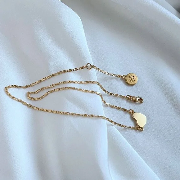 Tory Burch Elegant Gold Necklace with Heart and Disc Charms - Picture 4 of 7